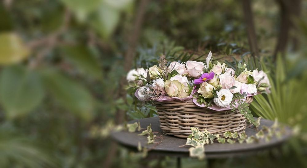 Wicker basket with small bouquets