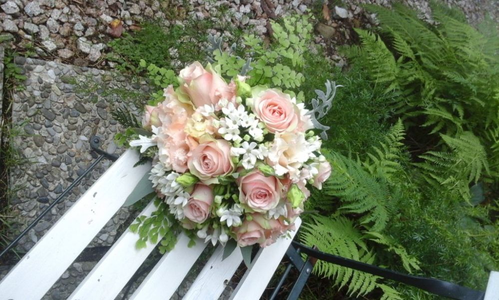 Bridal bouquet with roses and bouvardia